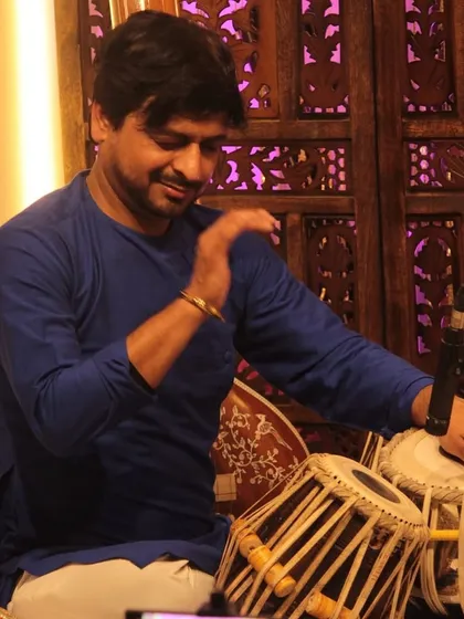 Sh. Kuldeep Mishra on the tabla, providing intricate rhythmic accompaniment during a Sarod recital. The interplay between the lead instrument and the tabla is a highlight of our instrumental concerts.