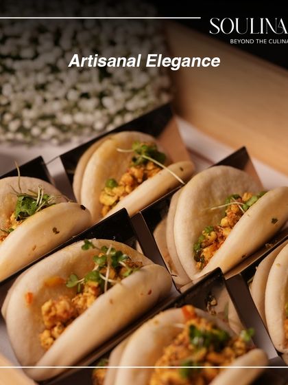 Artisanal elegance in the form of fluffy bao buns filled with a savory mixture and topped with microgreens. A perfect example of our handcrafted, globally-inspired appetizers.