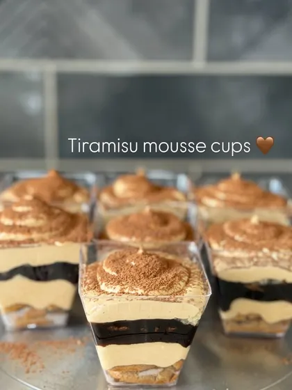 A tray of our Tiramisu mousse cups, ready for a party. They are always a crowd-pleaser.