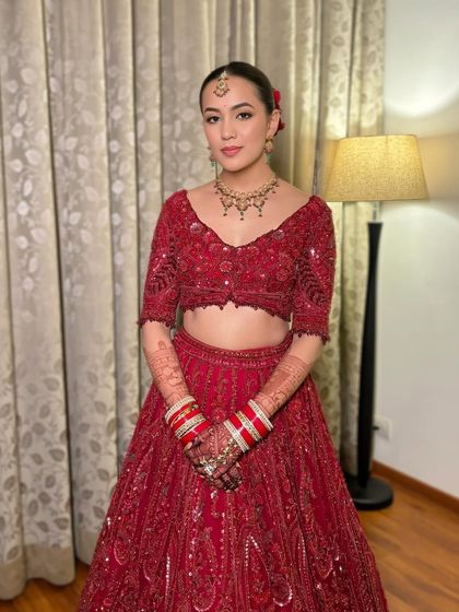 A beautiful portrait of Simran. Her makeup is subtle, with a focus on a flawless base and softly defined features.