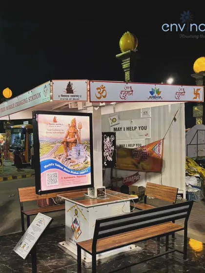 Our solar hut stands ready to serve the public in a busy area of Ayodhya. The "May I Help You" desk beside it shows how our installations can be integrated into broader public service initiatives.