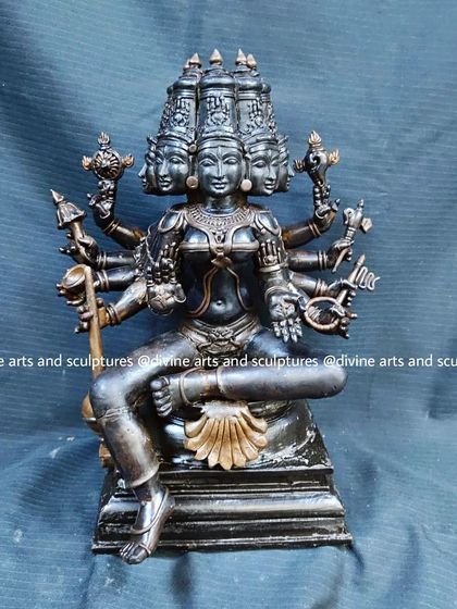 The wax model of the goddess Gayatri, distinguished by her five heads. This complex form is first perfected in wax to ensure all iconographic details are correct.