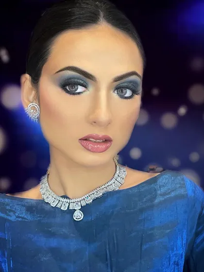 This is for the moments that call for pure glamour. A deep blue smokey eye paired with expertly applied lashes creates a sophisticated and bold look, perfect for evening events, cocktail parties, or any special night out.