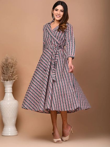 A full view of the striped Jaipuri print kurti dress. It features a flattering collar and a tie-belt to cinch the waist.