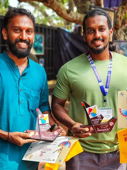 Posing with a fellow artist and our awards at the KALAPARBA event. Being part of a community of talented artists is inspiring and rewarding.