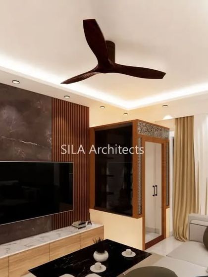 A wider view of the JP Nagar living room concept, showcasing the false ceiling design and the overall layout of the space.