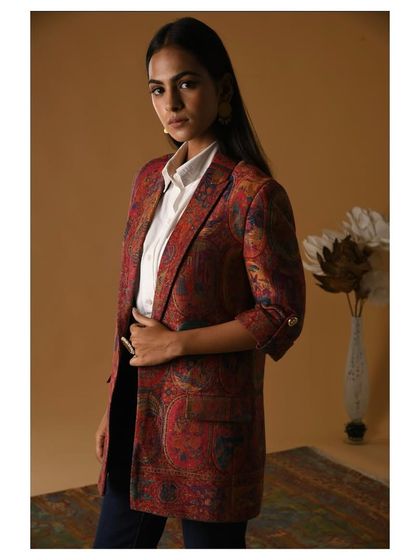 Styling a printed heritage blazer with a crisp white shirt for a campaign shoot. My goal was to create a polished and powerful look that feels both classic and contemporary, suitable for a modern working woman.