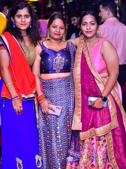 Ladies in beautiful traditional wear at the Dandiya Night.