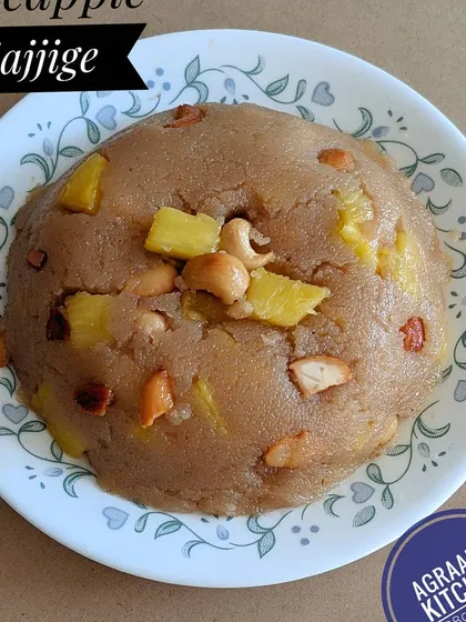 This is Pineapple Sajjige, a delightful variation of the classic Kesari Bath. It's a sweet semolina pudding cooked with ghee and sugar, enriched with chunks of fresh pineapple and crunchy cashews.