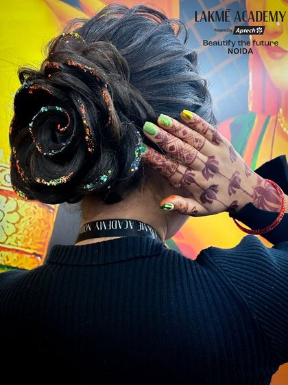 This shot shows how a beautiful hairstyle can complement other details like henna, creating a complete and polished look.