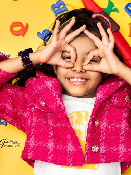 Kids photography is all about capturing their genuine energy and joy. For this 7-year-old's shoot, we used a vibrant, playful setup that allowed her personality to shine through in every frame.