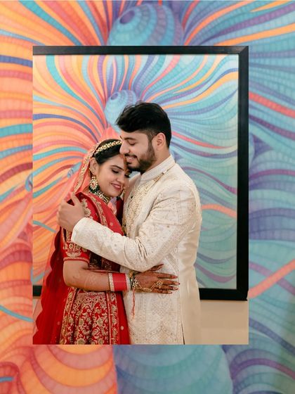 An artistic couple portrait, framed to create a unique and colorful composition. This shows my creative approach to wedding photography.