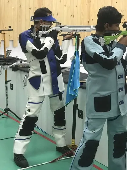 The focus and determination of our advanced youth shooters preparing for national-level competitions. We provide specialized training and competition-grade equipment to help our athletes perform at their absolute best.