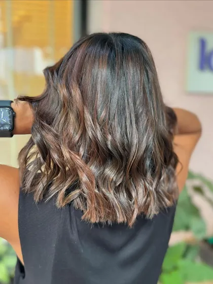 A rich espresso for this refreshing hair cut. The deep, dark brown tones are super glossy and make the hair look incredibly healthy. This is a non-bleach color.