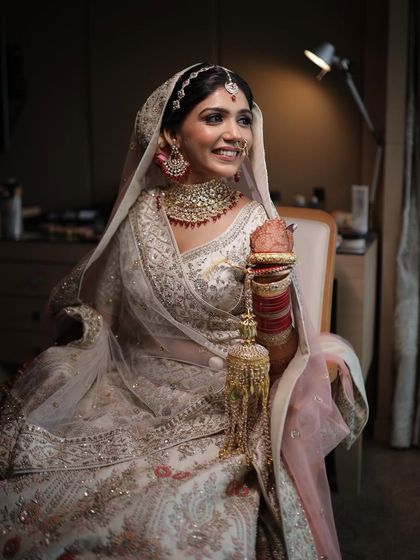 A happy, smiling portrait. She looks absolutely radiant and ready for her big day.