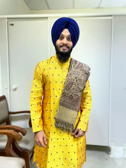 Dressed in a bright yellow kurta for a performance. The way we dress is also a part of the presentation and respect for the stage.