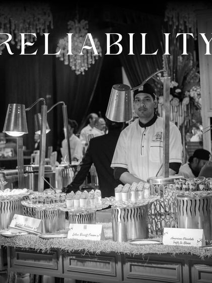 A black and white shot of our staff at a dessert counter, with the word "RELIABILITY" overlaid. It signifies our commitment to flawless execution and dependable service.