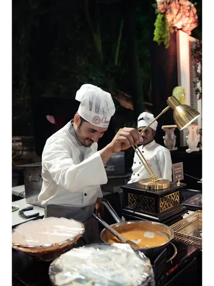 Our in-house 'Salt Bae' adding the final seasoning with flair. I encourage my team to have fun and interact with guests, making the experience more memorable.