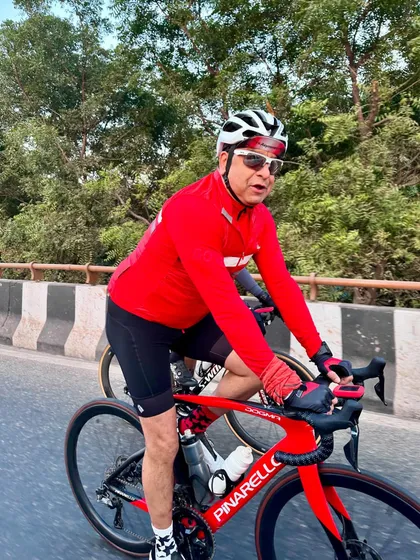 A close-up action shot of a rider on his Pinarello.