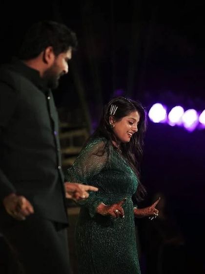 This happy couple is lost in their own world on the dance floor. My goal is to make you feel so comfortable that you forget anyone is watching.