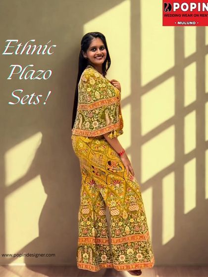 A stunning yellow ethnic plazo set that glows with elegance. The intricate patterns and flattering silhouette make it a perfect choice for a haldi or mehendi ceremony.