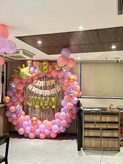 The 18th birthday ring setup shown within the context of the restaurant space.