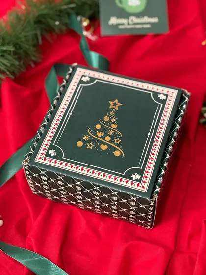 An elegant green and white patterned Christmas gift box. The sophisticated design is perfect for premium corporate gifts or for that special someone.