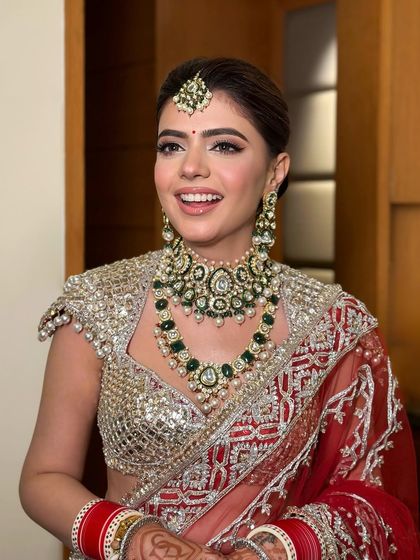 The joy of a bride on her wedding day. Her smile says it all, and the makeup is there to make sure she feels as beautiful as she looks.