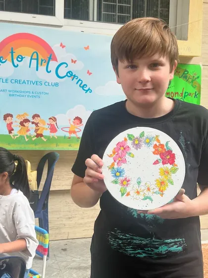 We cater to all ages and skill levels. It's so rewarding to see older kids dive into a project and create something they are truly proud of, like this beautifully detailed painted plate.