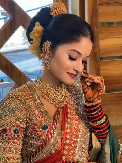 A candid, happy moment captured, showing the bride's natural smile.