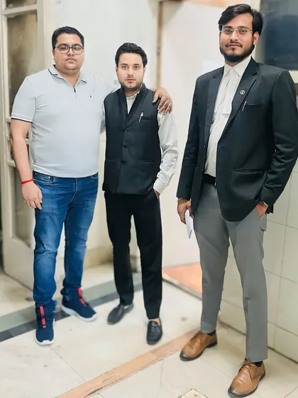 Posing with colleagues. My network of fellow Yadav and Ahir advocates provides a strong community of support.