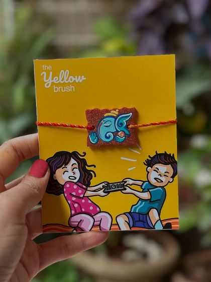 A Ganesha-themed Rakhi, perfect for bringing blessings to your brother.