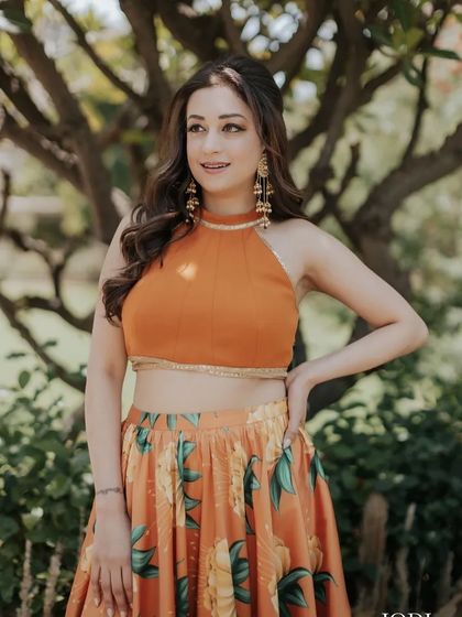 A close-up of the client, her wavy hair framing her face beautifully.