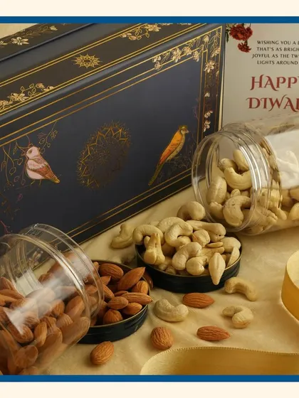 A touch of luxury with our royal blue Diwali hampers. These book-style boxes with bird motifs are filled with premium dry fruits, making for a very sophisticated festive gift.