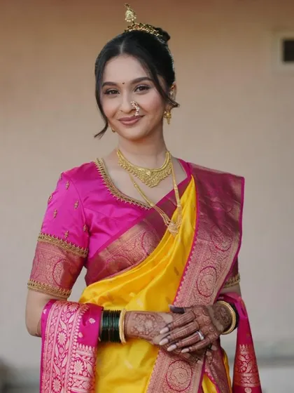 The final look. Seeing a bride, radiant and happy on her big day with my mehendi, is the best feeling. The rich stain of the henna beautifully complements her traditional attire.