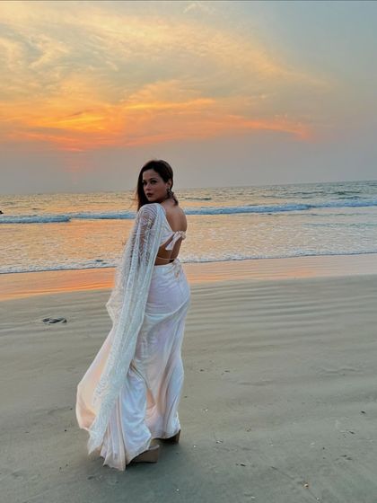 A classic "Sooraj Hua Maddham" moment on the beach. Hosting destination weddings is not just a job; it's about living out those filmi dreams with my clients.