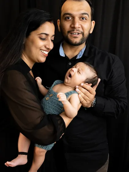 Even a sleepy yawn is a moment to cherish. I love capturing these real, unposed moments that show the sweet personality of your little one right from the start.
