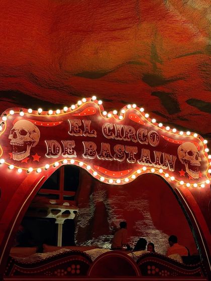 A custom-made, light-up marquee sign for 'El Circo De Bastian,' a spooky circus-themed Halloween party.