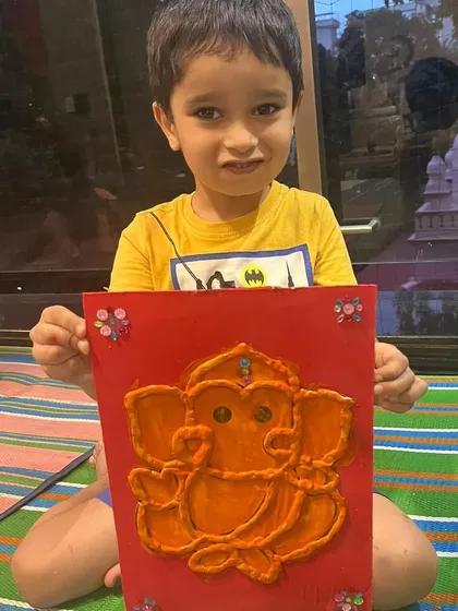 So proud of this little artist and his beautiful Ganesha creation. During our festival workshops, children get to connect with culture through hands-on art, like making their own clay idols.
