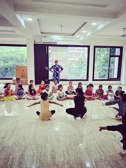A class in session at our spacious and well-lit studio in Indirapuram. We provide a professional and comfortable environment for our students to learn and grow.