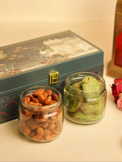 The contents of the Desi Diwali Dazzle Box, featuring my sweet and spicy nuts and pistachio cardamom cookies.