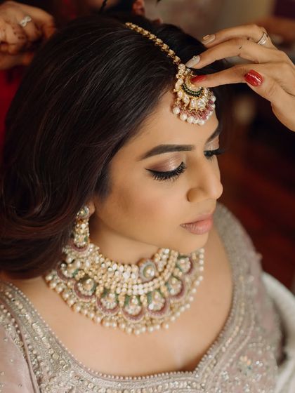 A beautiful close-up of a soft glam wedding look. Notice the fluffy lashes and softly blended eyeshadow, techniques you will master in my course.