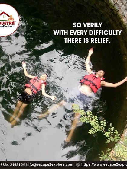 Find relief from your routine by floating freely. Two guests relax and enjoy the cool water of the well after their jump.