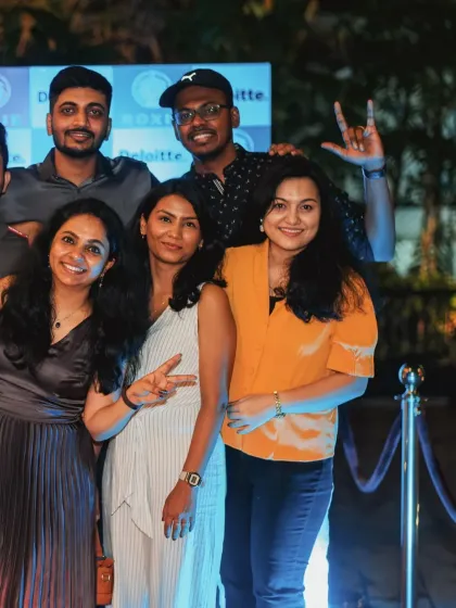 I love seeing my spaces filled with laughter and connection. Here, a corporate team from Deloitte celebrates a milestone, turning a work event into a genuine memory. This is what I do best.
