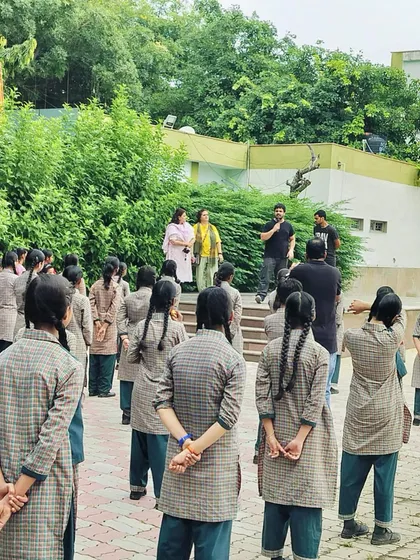 Addressing the students during the self-defense program. Building the right mindset and teaching awareness is just as important as the physical techniques.