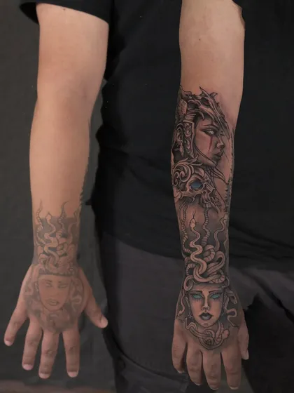 Sometimes you don't need to cover, you need to continue. I extended this client's existing Medusa hand tattoo up the forearm, blending the new art to complete the story.