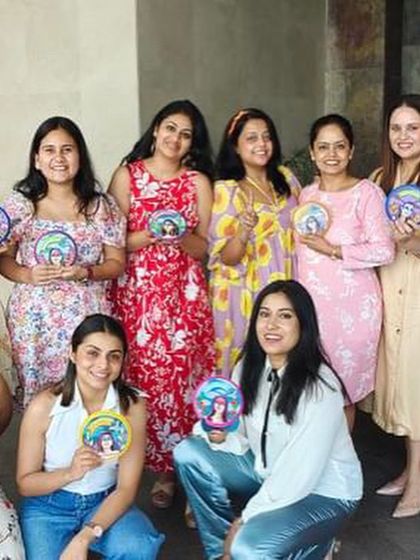 Another great shot of the team with their custom painted mini plates. These make for wonderful corporate gifts or mementos from a team event.