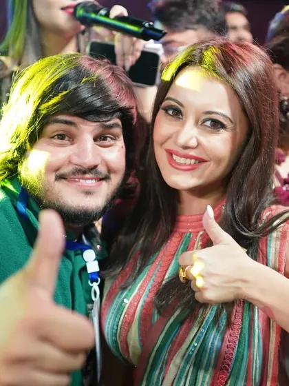 A happy moment with actress Minissha Lamba. My goal is to create a fun and positive atmosphere for both the artists and the audience.