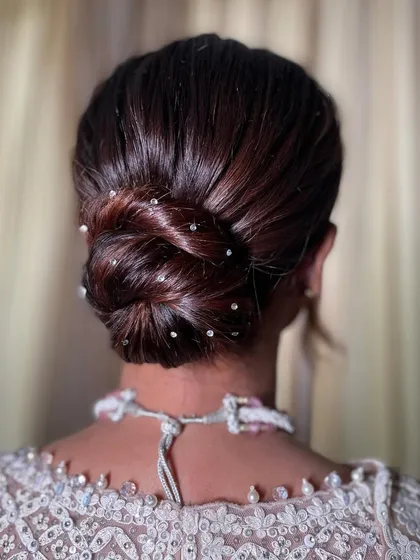 Another view of the Swarovski knot bun, showing how the light catches the crystals. It's a subtle yet very glamorous detail.