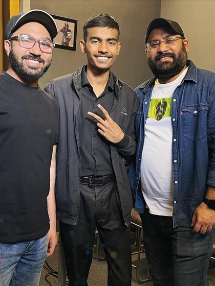 Another student with the instructors. We are proud to build a community where students feel comfortable approaching us for advice and guidance.